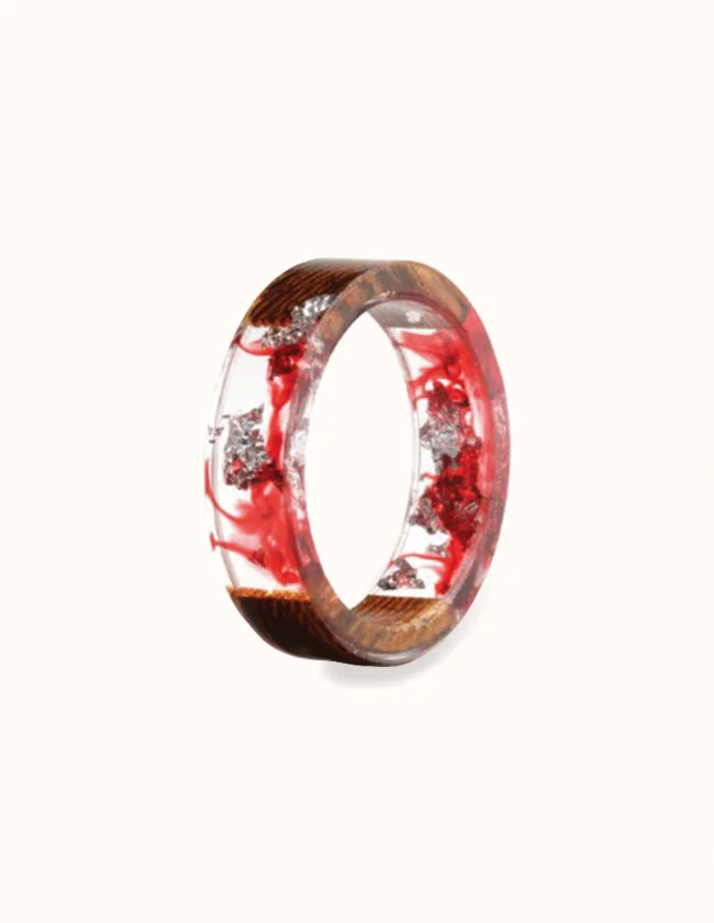 Bague en résine époxy et bois de pêcher
